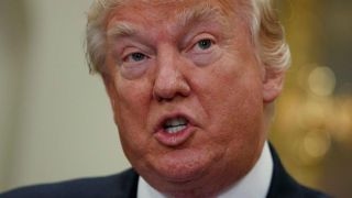 Trump 'demonizing' Haitian migrants with immigration review