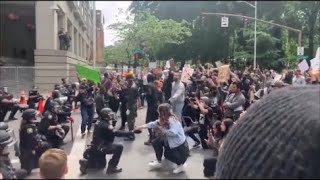 Portland Police Kneel to Protesters.
Scenes from the protests in Portland Oregon. Portland Police Kneel to Protesters.