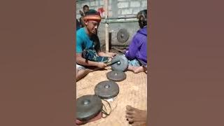 Gong ini dimainkan oleh Pak Ming.dgn bunyi irama gong yaitu lagu Tinagu Le.