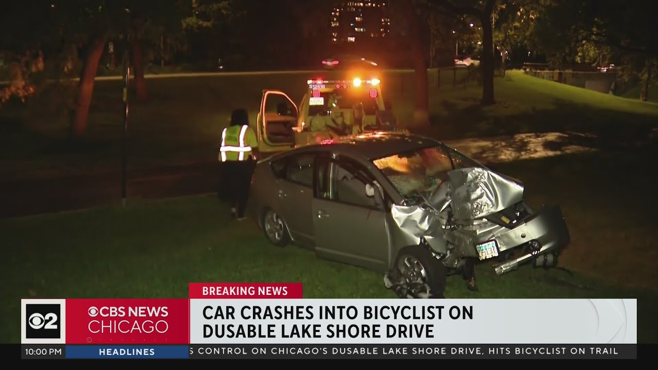 Car crashes into bicyclist on DuSable Lake Shore Drive - YouTube