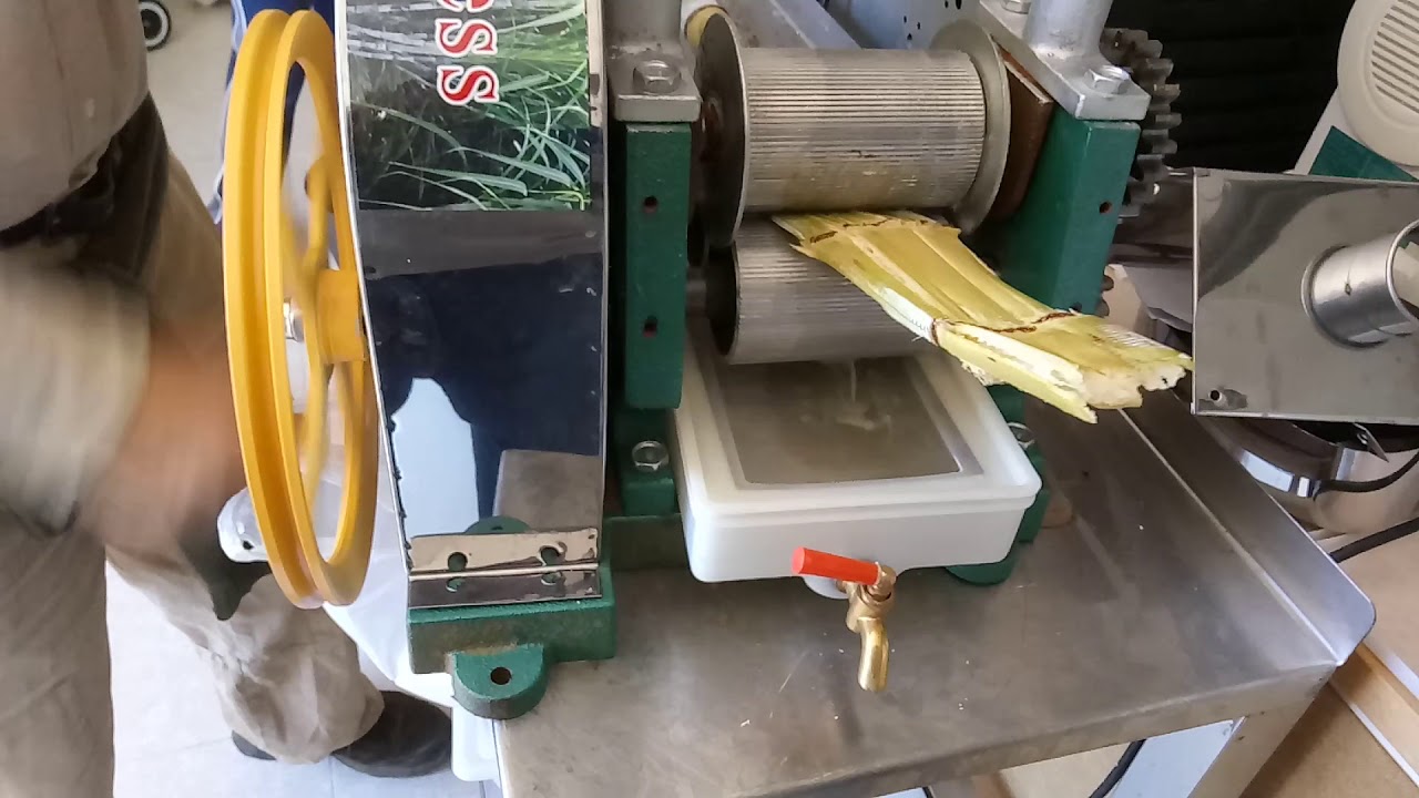 Extracción de jugo de caña de azúcar - YouTube