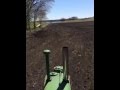 John Deere Unstyled G spring field work with the Melroe drag harrow