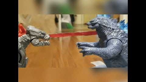 Mecha Sharkjira vs. Sharkjira.  (stop motion)