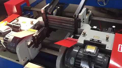 Automatic feeding long material double head chamfering machine