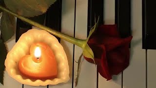 Rose And Candle On Piano  Stock Video screenshot 2