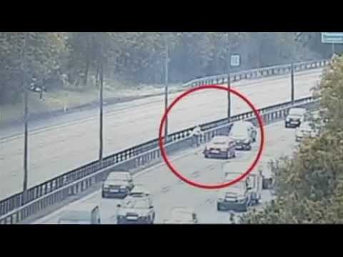 shocking footage: two demented insane women run in front of oncoming traffic on motorway