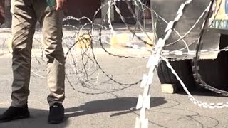 Containers are placed on roads in Lahore ahead of planned protest by the PTI Containers are placed on roads in Lahore ahead of planned protest by the PTI