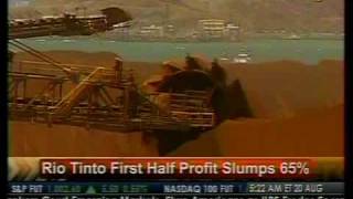 Rio Tinto First Half Profit Slumps 65% - Bloomberg