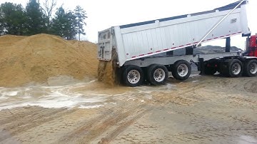 Reverse video of tipper semi-trailer unloading wet sand #reverse #trailer #wetsand