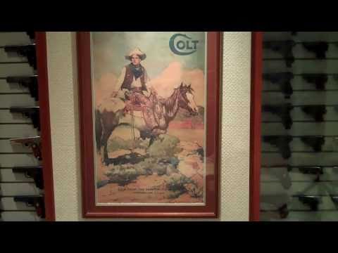Early 20th century Spanish language Colt advertisement featuring a cowboy on horseback.