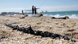 Israeli beaches hit by mystery oil spill