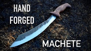 Forging a large machete out of rusted metal