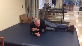 Supine to long sit walk around method for a patient with C6 Tetraplegia