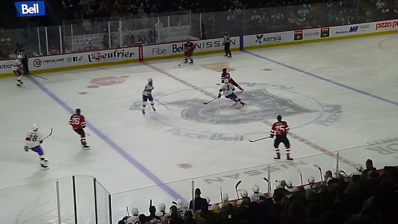 Utica Comets' Nico Daws makes a big save vs. Brandon Gignac of the Laval Rocket 10/30/24