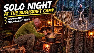Solo night at the bushcraft camp building a fence and cooking up a basic dinner
