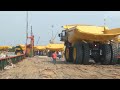 LOADING THE MONSTER OF TRUCK .