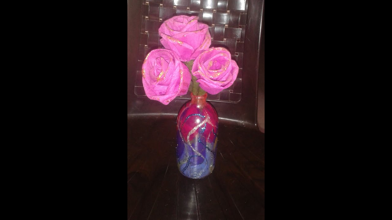 easily recycle a glass bottle into beautiful flower vase using nail