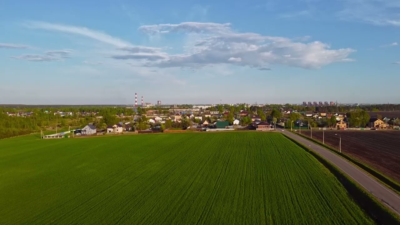 Aerial Sunset View of Corn Fields and Tver Countryside in Spring