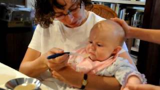 First babyfood with a spoon