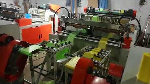 Automatic roll changing coreless garbage bag making machine