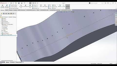 perpendicular holes on curved surface in solid works