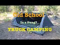 Truck camping old school  using a swag in the usa
