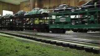 MTH Railking Norfolk and Western Y6b leads the Autotrain on the Hi Rail layout in HD