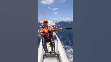 Riding ocean swells in a kayak is epic