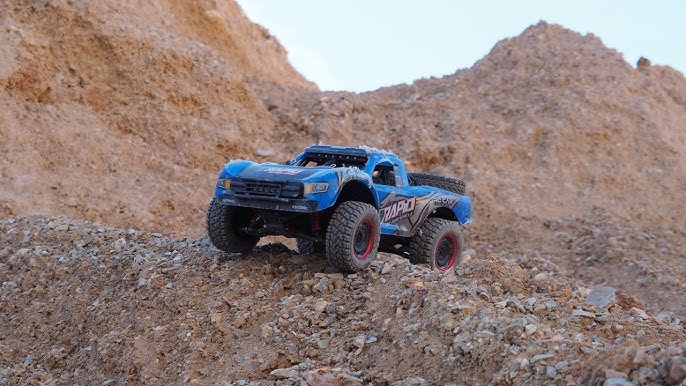 Fesexoul Coche Teledirigido 40KM/H, 1:18 4WD Offroad Coche RC Alta