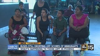 Buses dropping off scores of immigrants