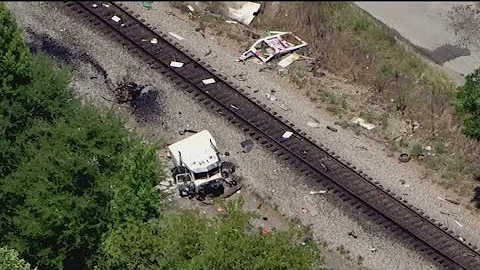 Train bursts into flames after crash with semi-truck in Union City; 2 injured