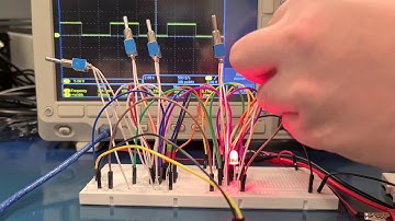 LAB 2 Experiment with 4 Bit Memory using D flipFlop