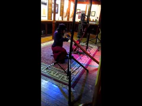Donna Eagle playing didgeridoo