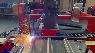 QJAR welding robot is working  with a single-axis positioner