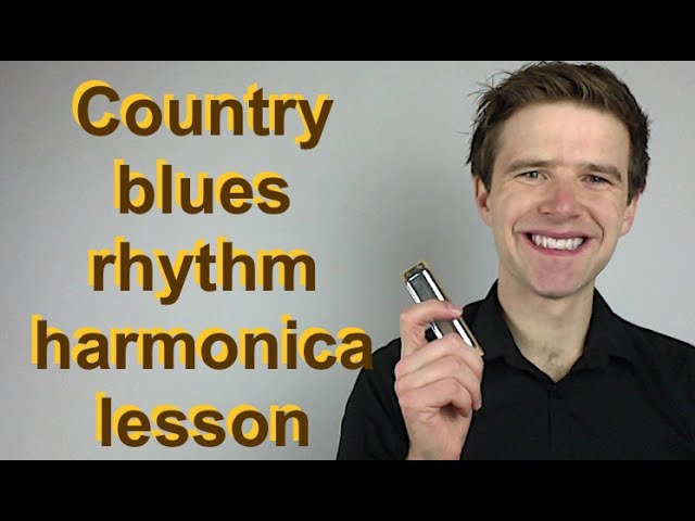 Image of smiling man holding harmonica. Text: "Country blues rhythm harmonica lesson"