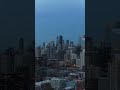 Iconic Chicago skyline featuring John Hancock Center and downtown skyscrapers with illuminated