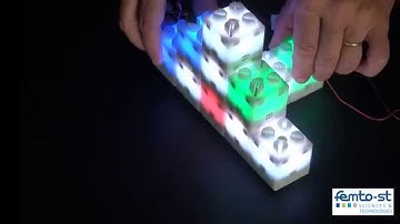 ABC-Center: Approximate-Center Election in Modular Robots