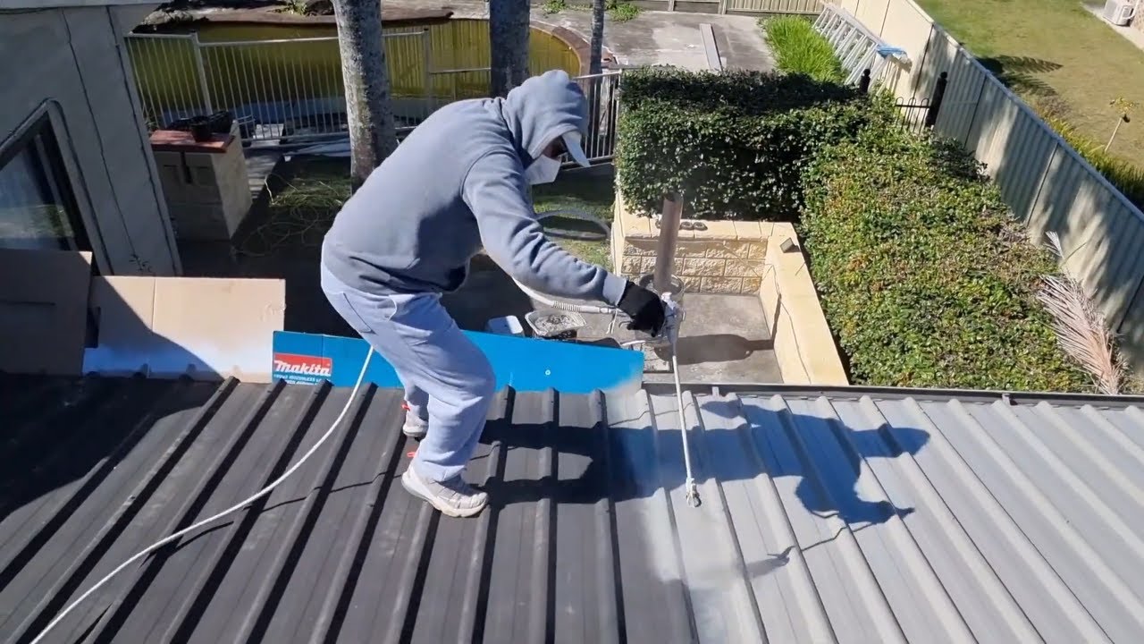 Painting a Roof Easy by Yourself with a Rented Spray Gun