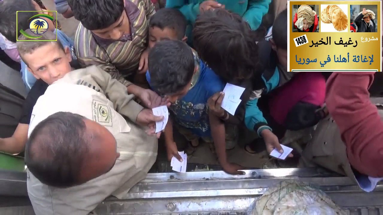 منادي الخير - 711 - توزيع الخبز في بلدة أباد - حلب - سوريا - 31 - 10 - 2016