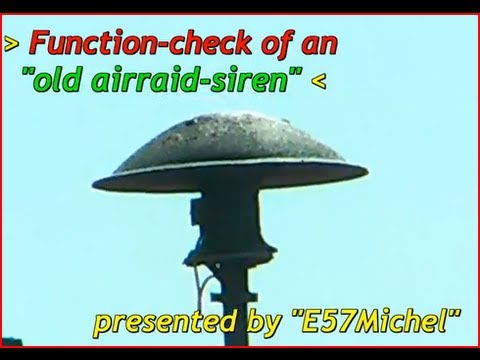 Old German WW2 air raid siren - full in loud Action