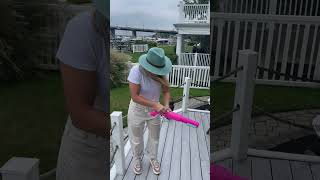 Woman shotguns a High Noon drink using a Shotfun Shotgun!
