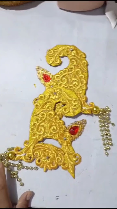 sumping tari pria atau anting tari jawa