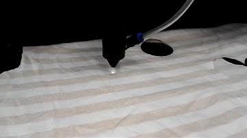 Máy cắt vải tự động bằng tia LASER cắt vải da các loại ngành may