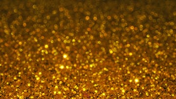 Gold glitter background with sparkling texture 2021