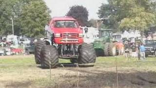 Mongoose Pro Monster Trucks Blowing A Mud Pit.