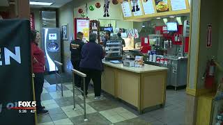 Man uses chair to stop fast food robbery