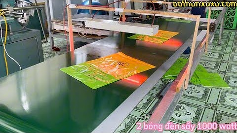 Test khả năng sấy khô mực in lụa trên túi nylon bằng băng tải tự làm dài 2 mét