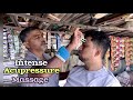 Intense acupressure head massage and back massage by street barber