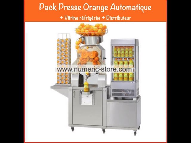 Presse Orange Automatique en action / Commercial Orange juicer 