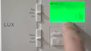 Lux TX100e thermostat set date and time